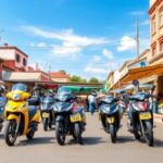 Motos estacionadas en una calle de ciudad soleada.