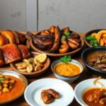 Platos variados de comida tradicional sobre mesa.